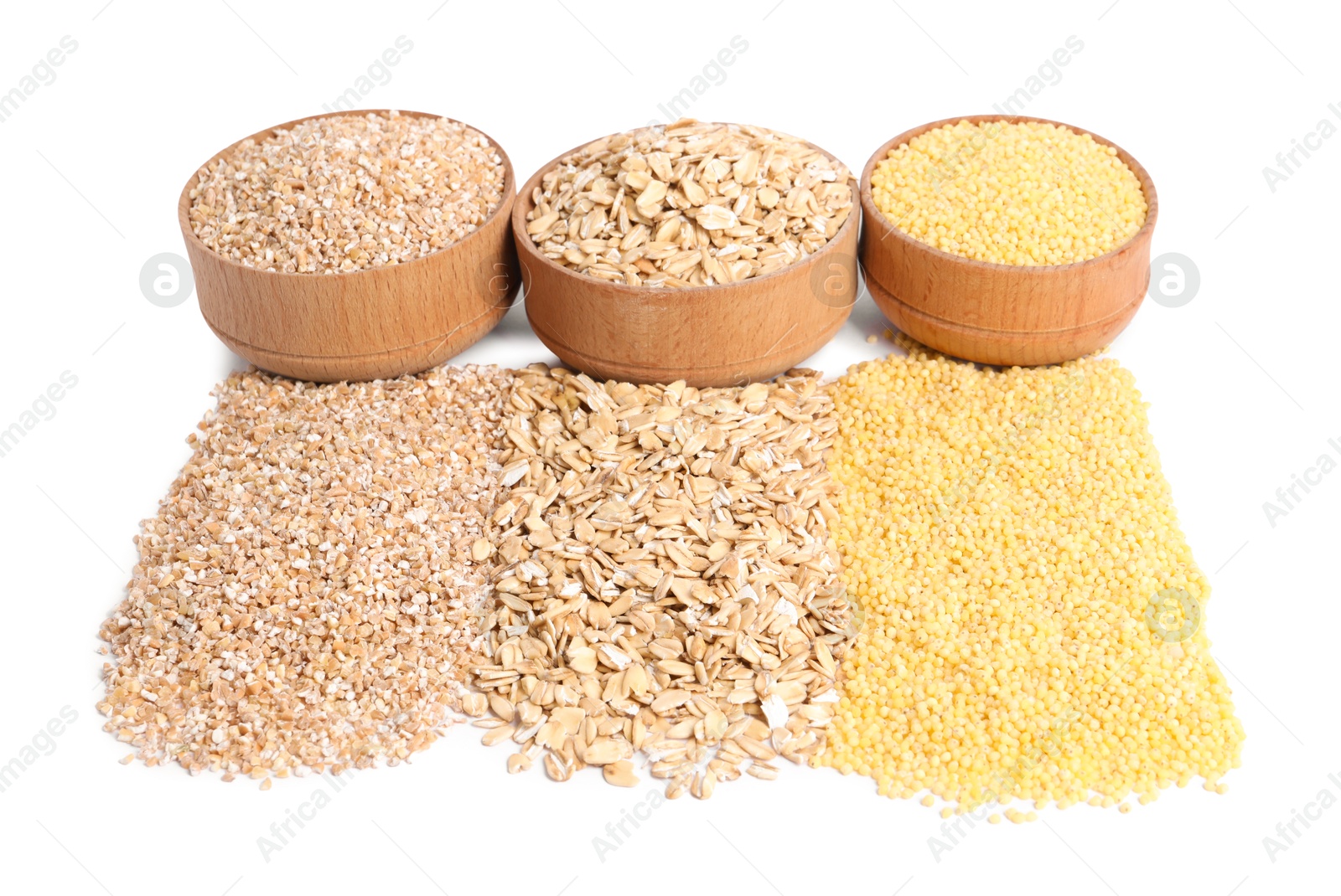 Photo of Piles of different cereals and bowls isolated on white