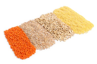 Photo of Piles of different cereals and lentils isolated on white