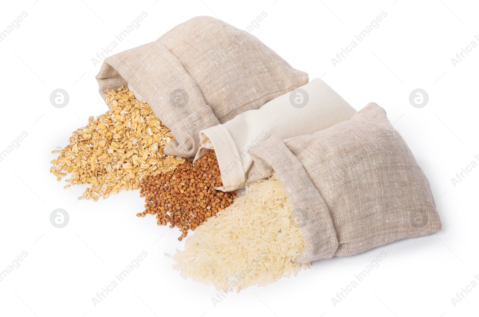 Photo of Different types of cereals in sacks isolated on white