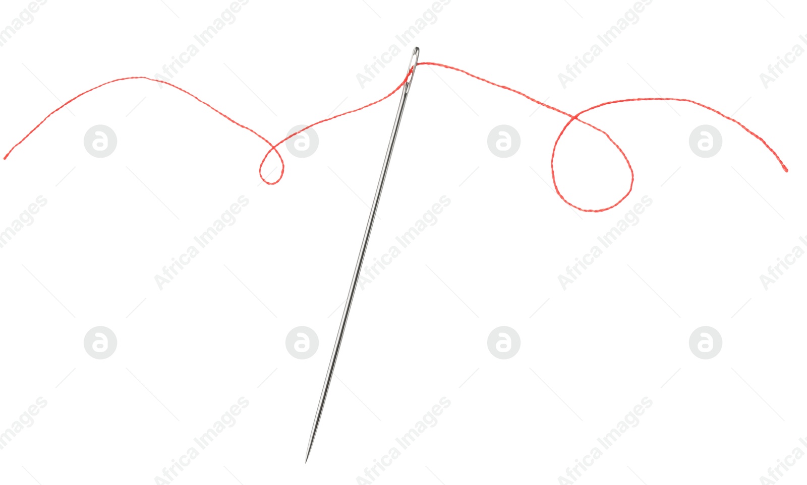 Photo of Sewing needle with red thread isolated on white