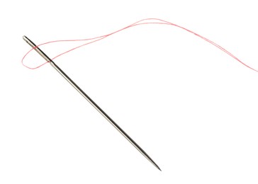 Photo of Sewing needle with red thread isolated on white