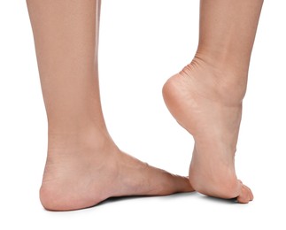 Photo of Woman with smooth feet on white background, closeup