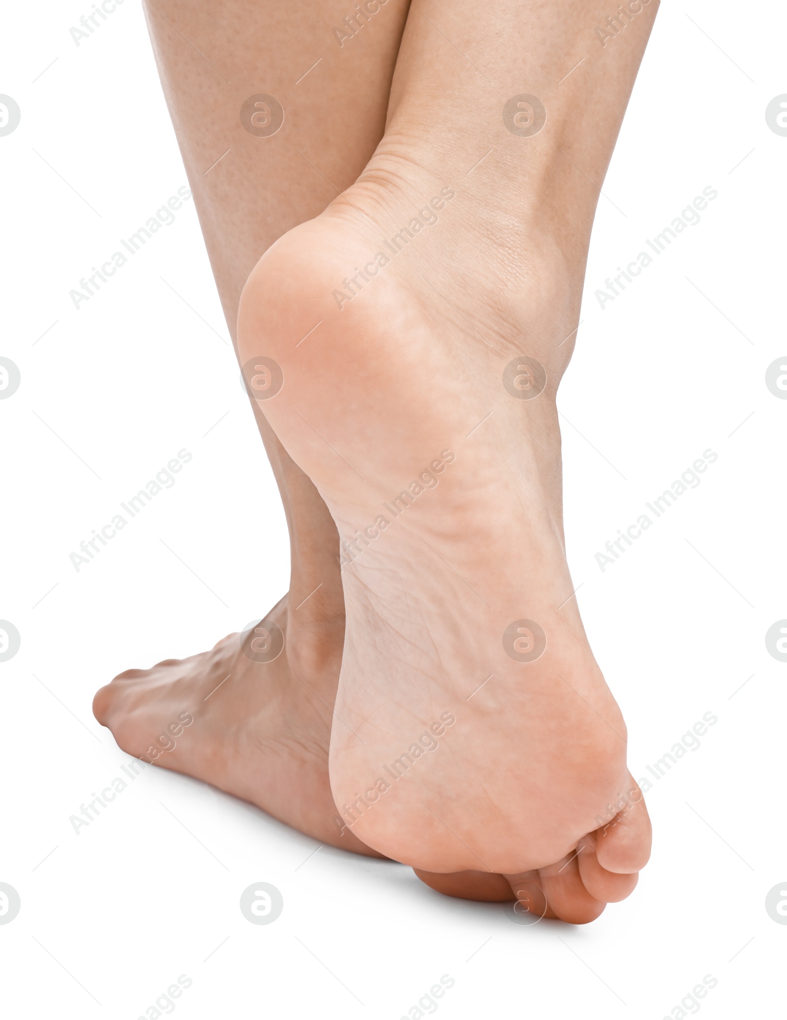 Photo of Woman with smooth feet on white background, closeup