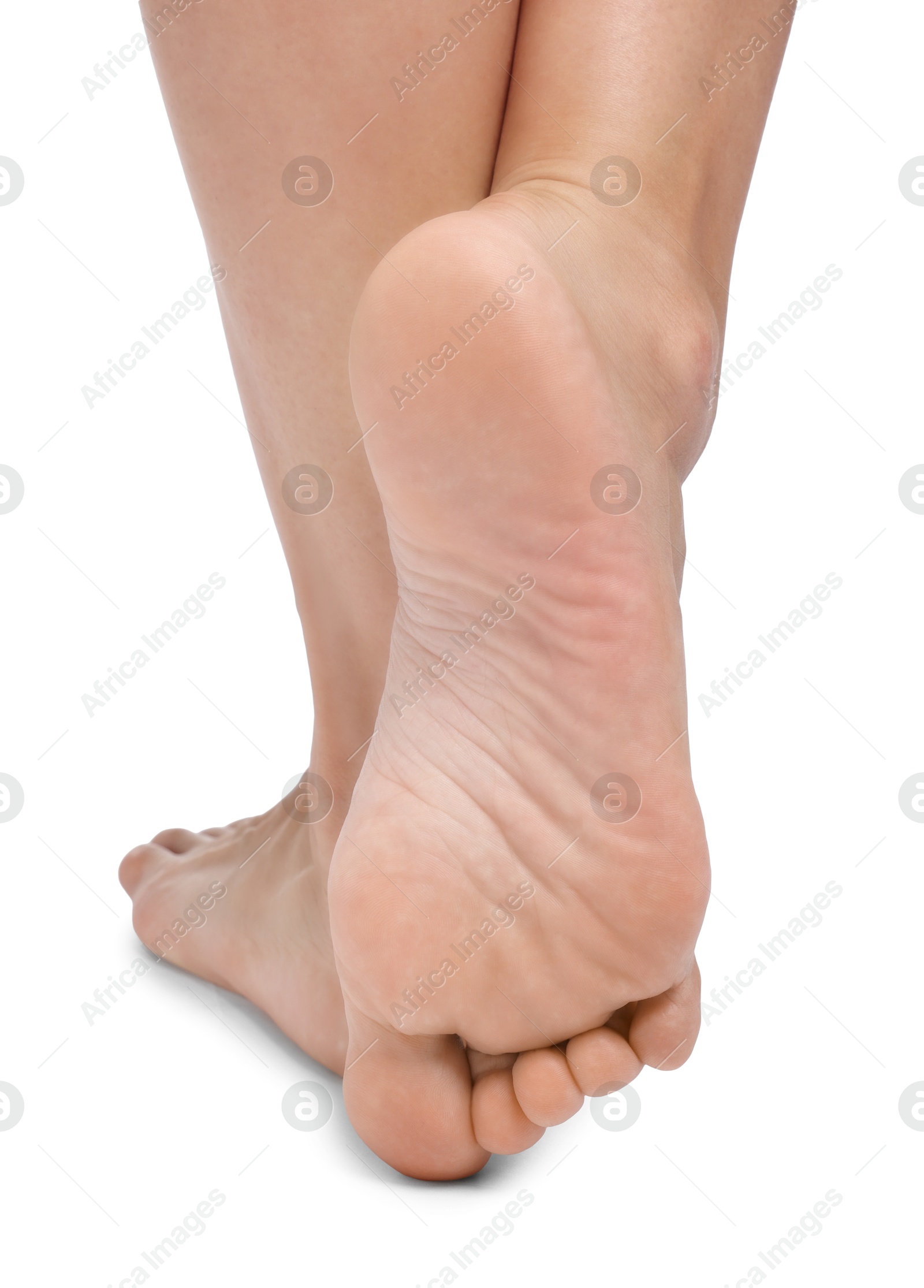 Photo of Woman with smooth feet on white background, closeup