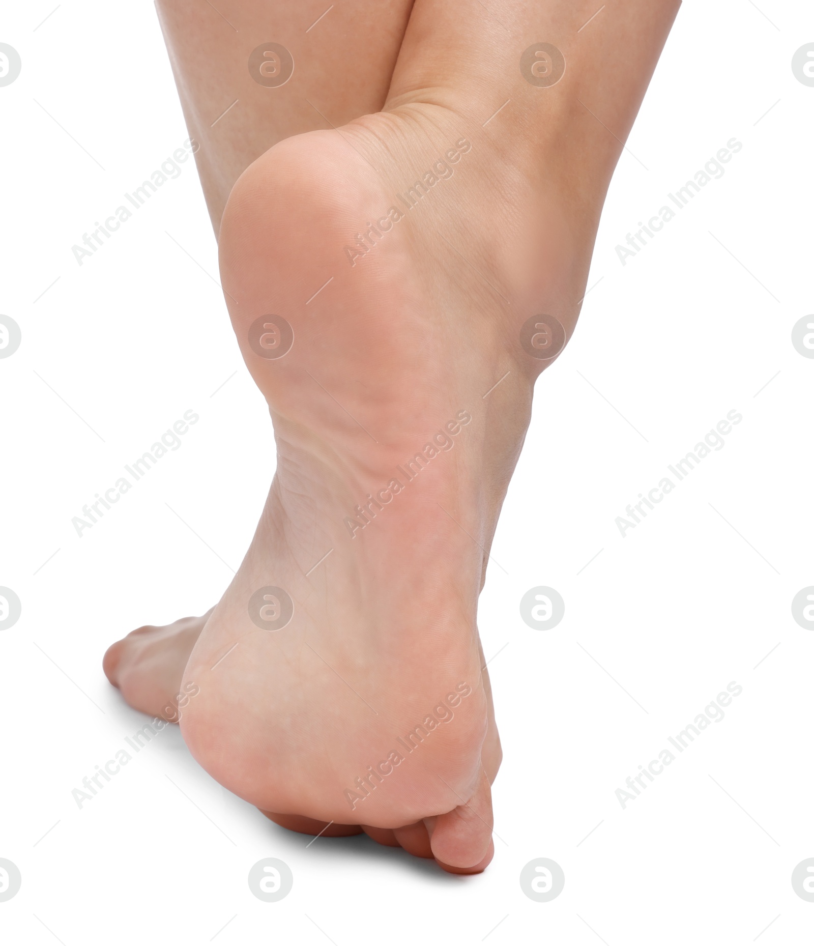 Photo of Woman with smooth feet on white background, closeup