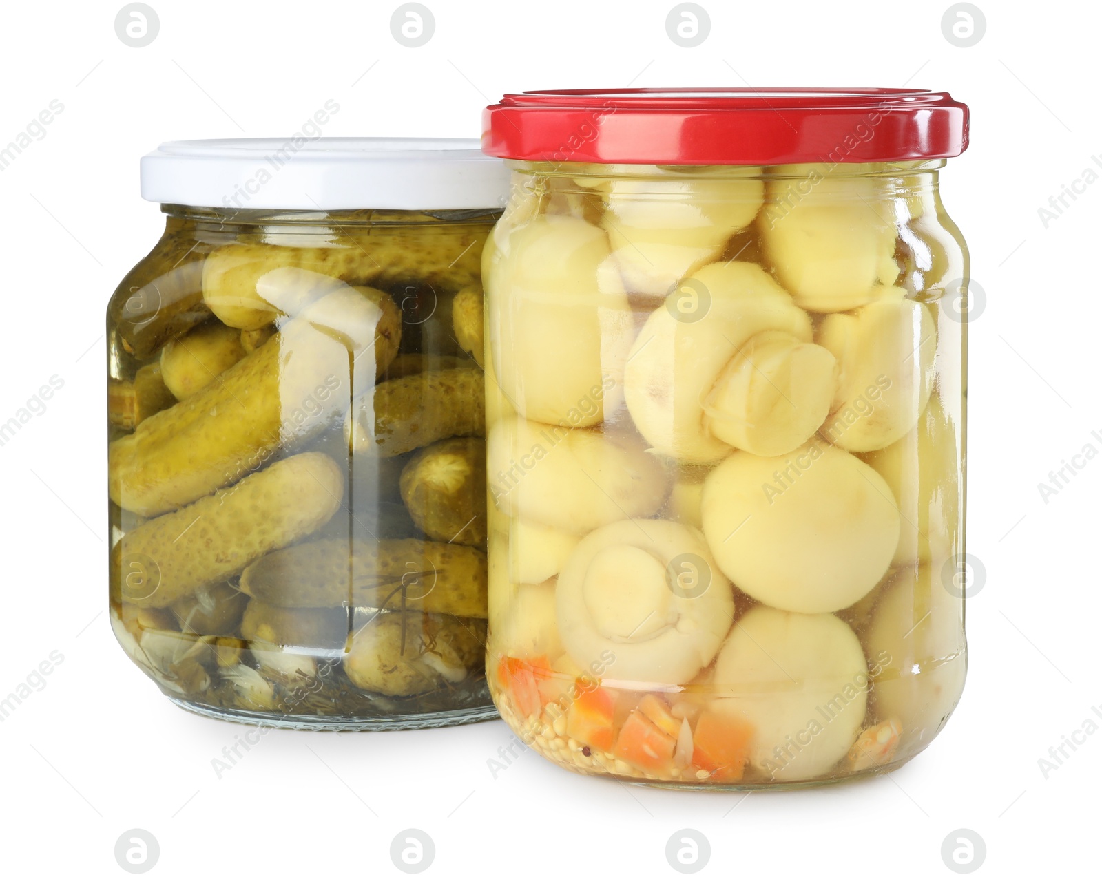 Photo of Different pickled products in jars isolated on white