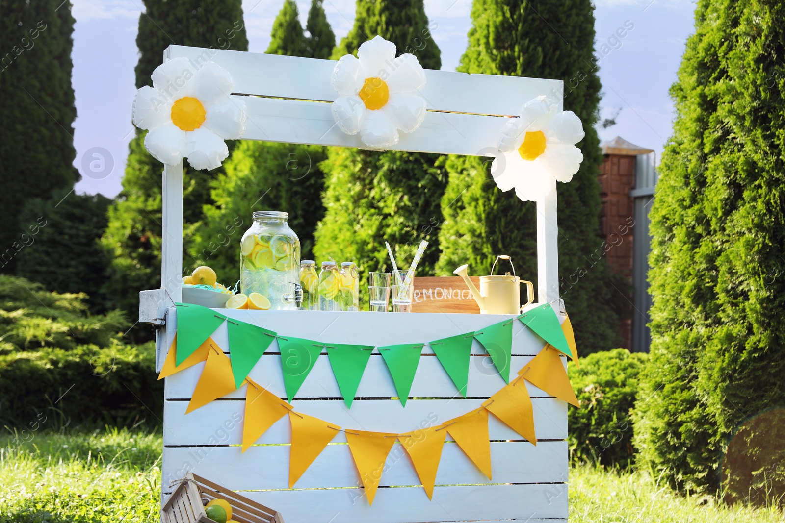 Photo of Lemonade stand with refreshing drink in park