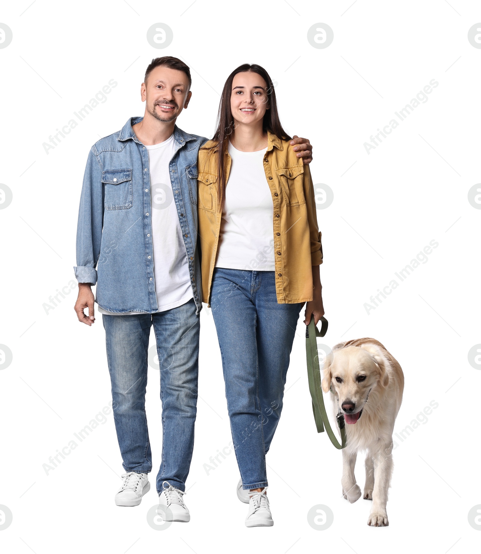 Photo of Walking with dog. Happy couple with Golden Retriever on white background