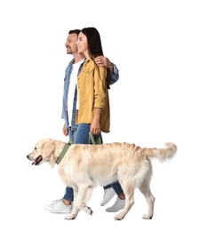 Photo of Walking with dog. Happy couple with Golden Retriever on white background