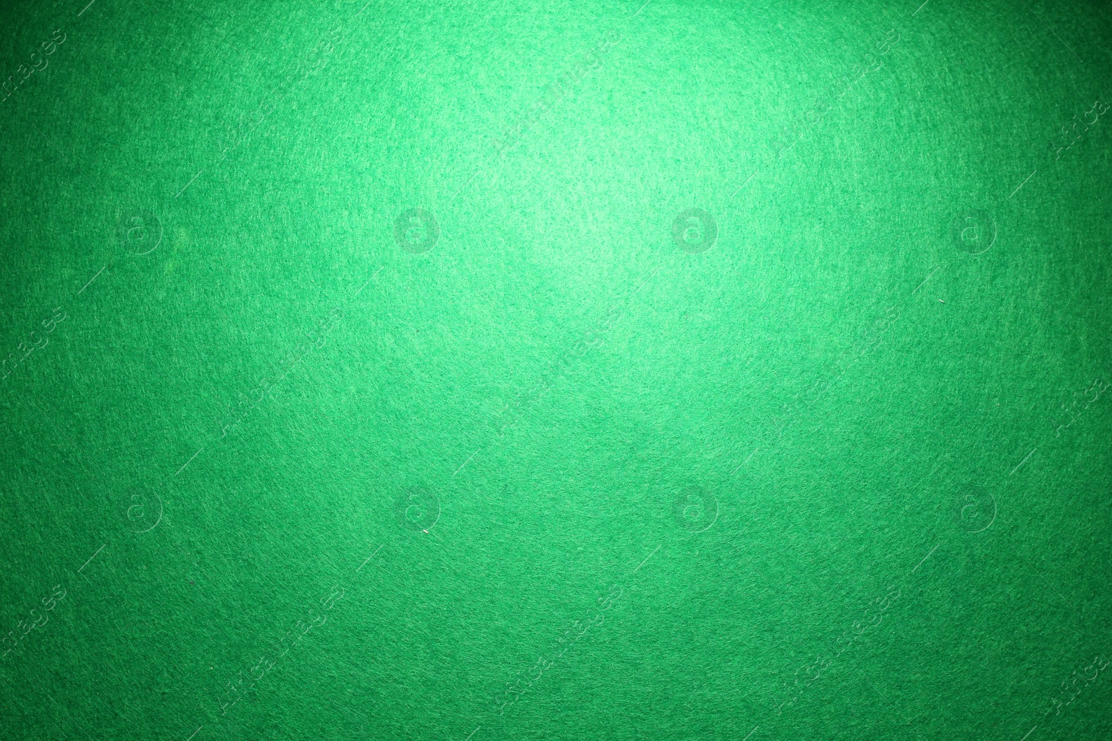 Photo of Green poker table as background, top view