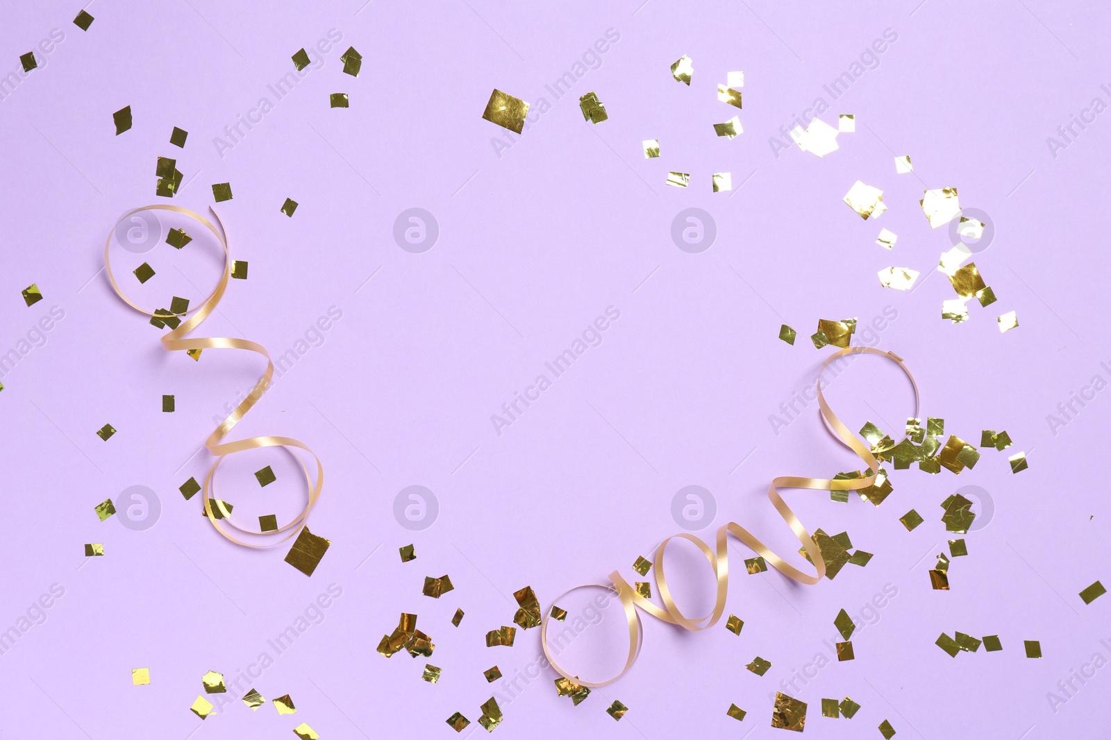 Photo of Frame of shiny confetti and streamers on violet background, flat lay. Space for text