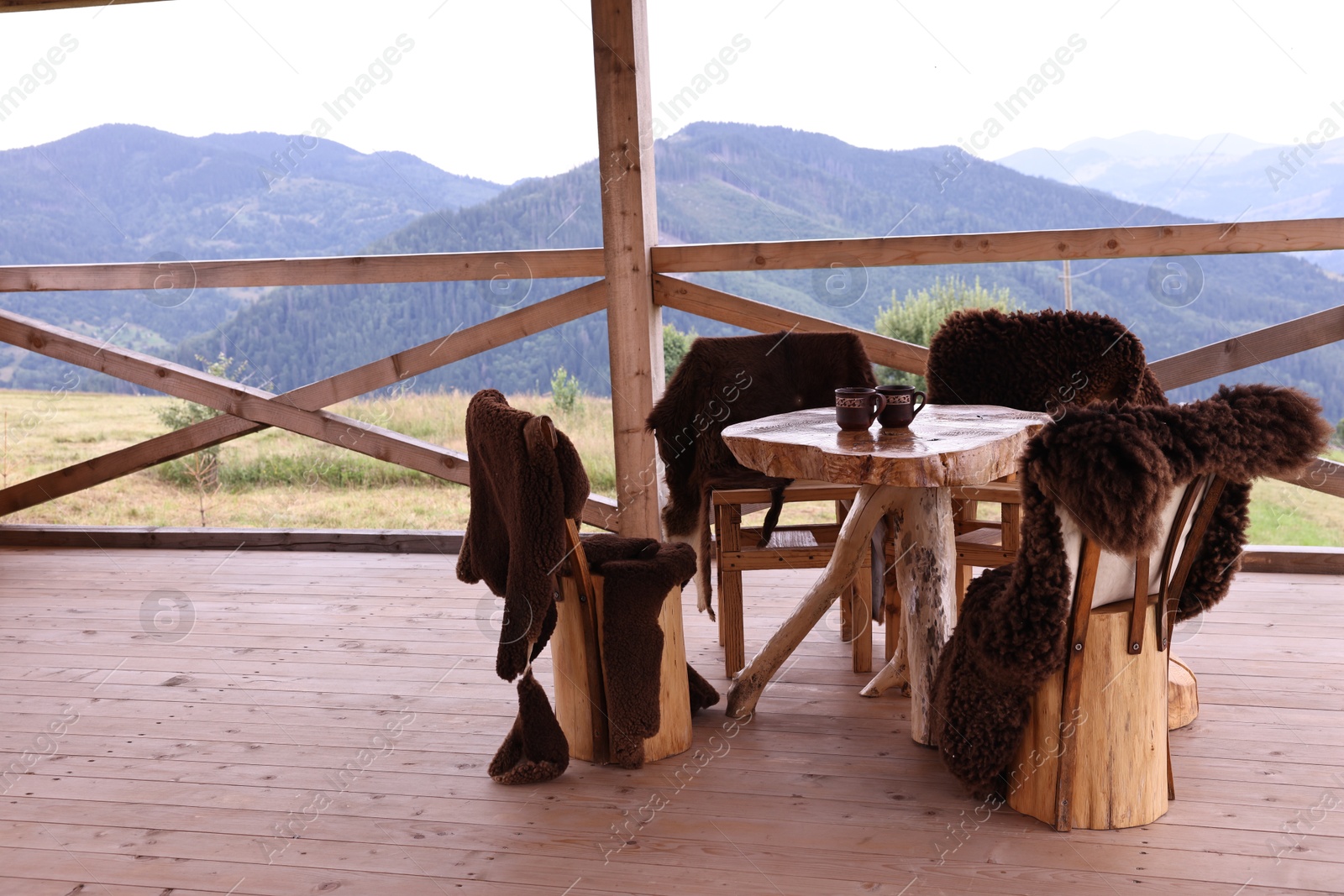 Photo of Cozy cafeteria with stylish furniture in mountains