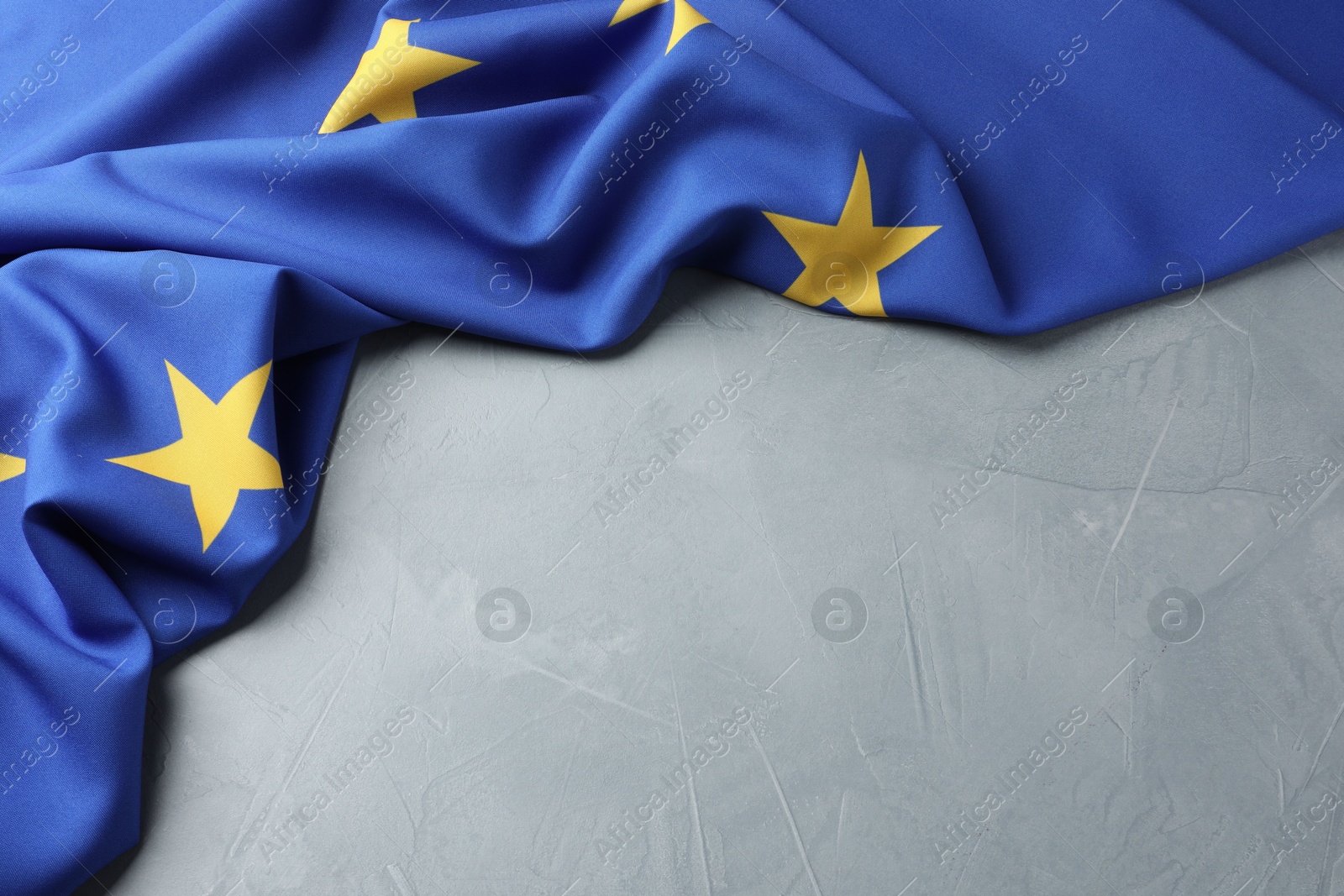 Photo of Flag of European Union on light grey table