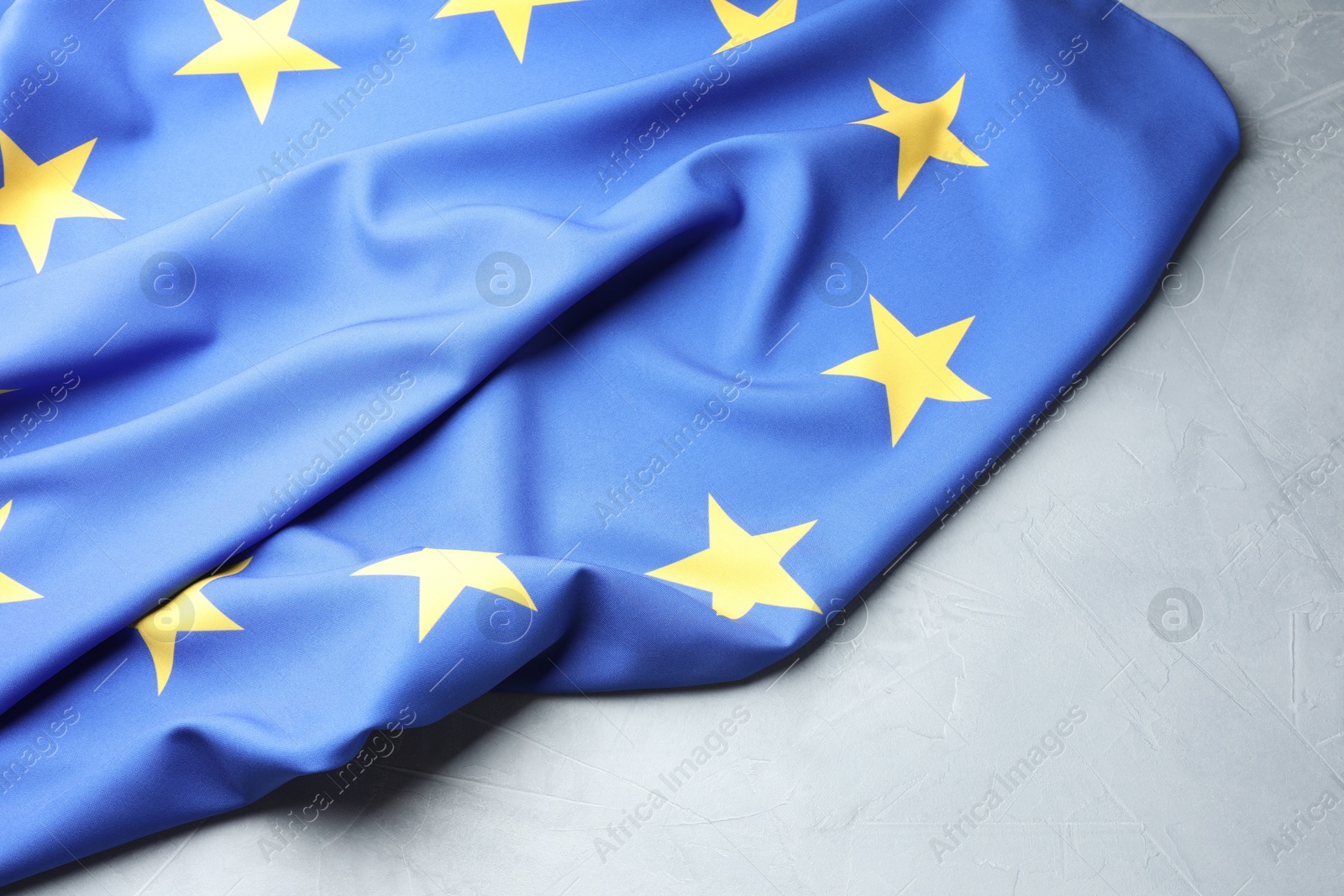 Photo of Flag of European Union on light grey table