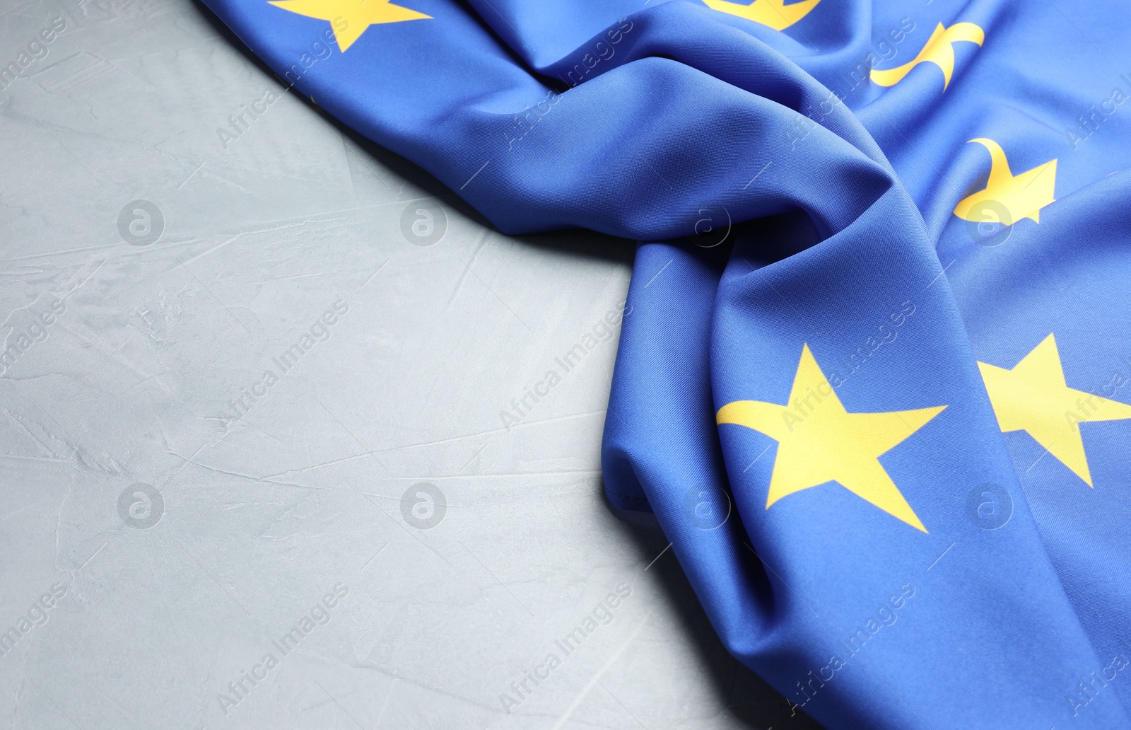 Photo of Flag of European Union on light grey table