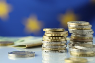 Photo of Many different euro coins on table, closeup