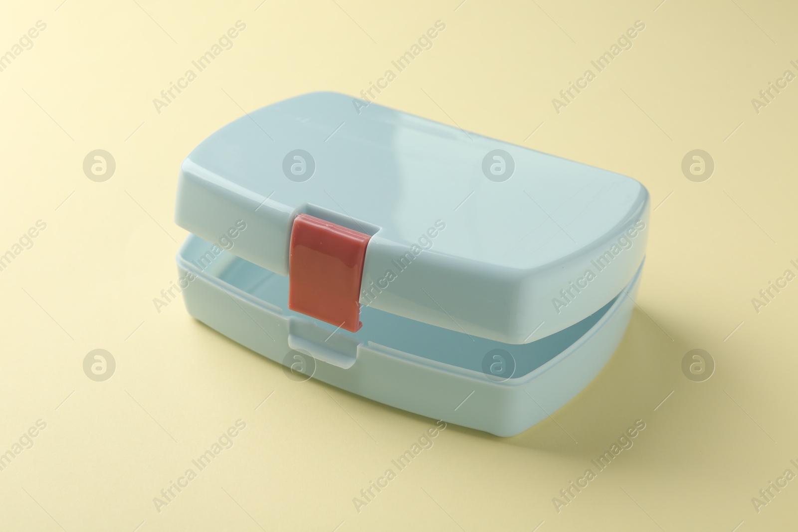 Photo of One empty lunch box on beige background