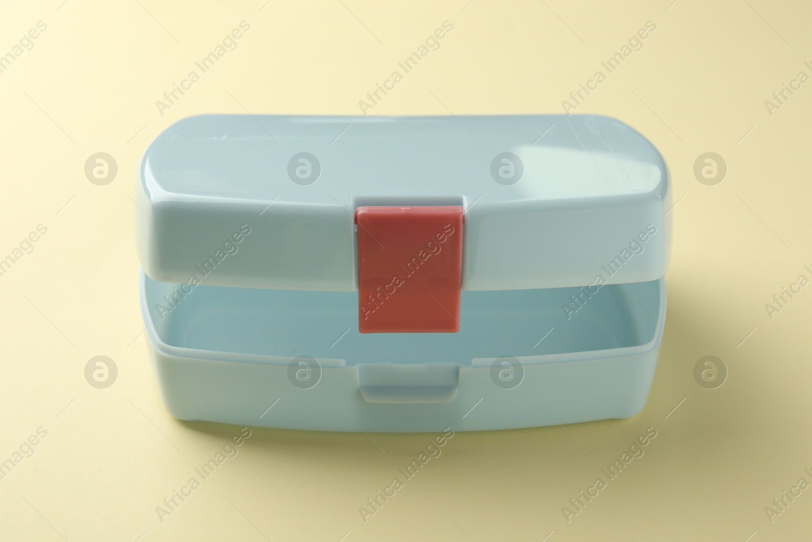 Photo of One empty lunch box on beige background