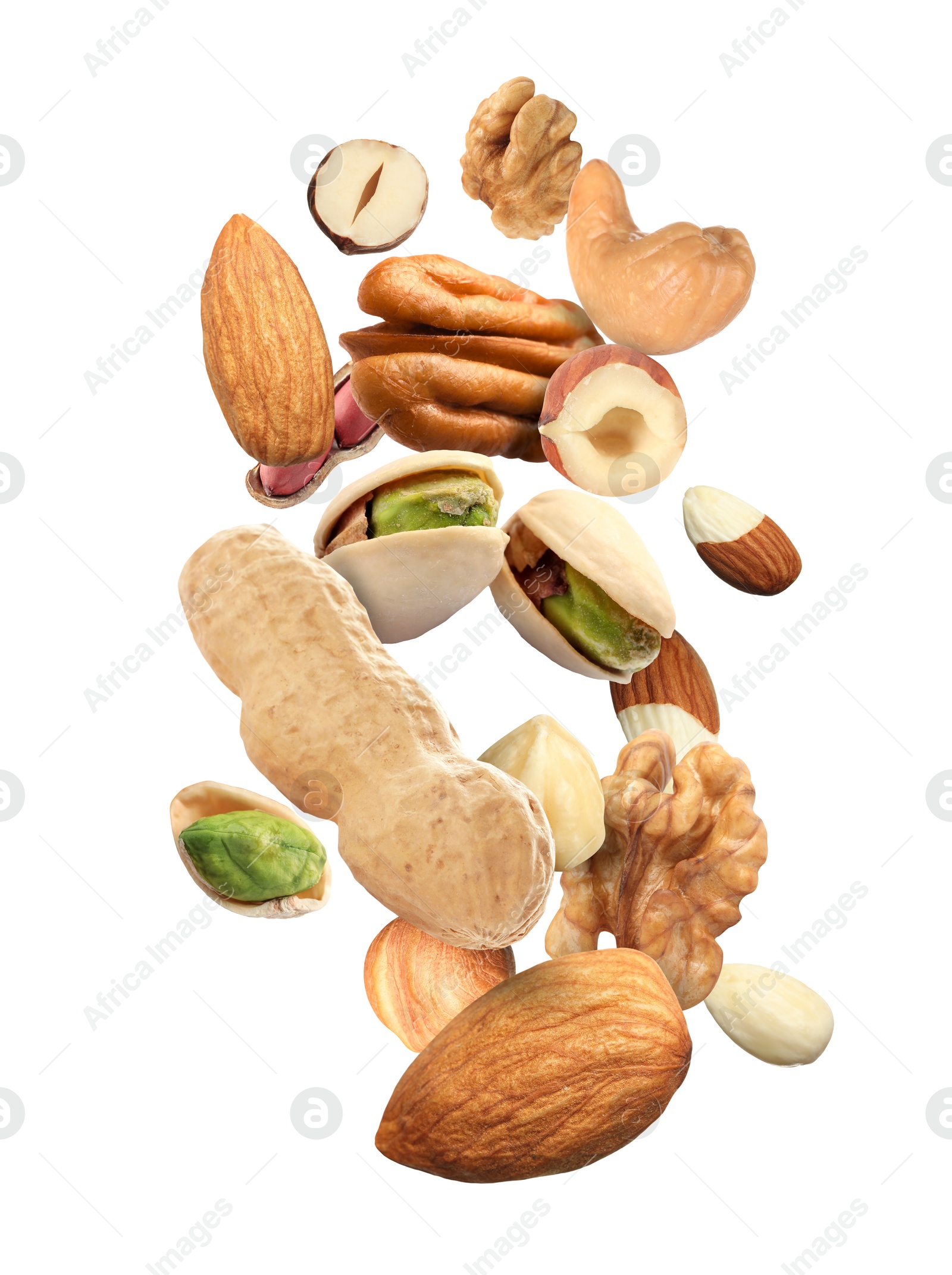 Image of Pecan and other nuts in air on white background