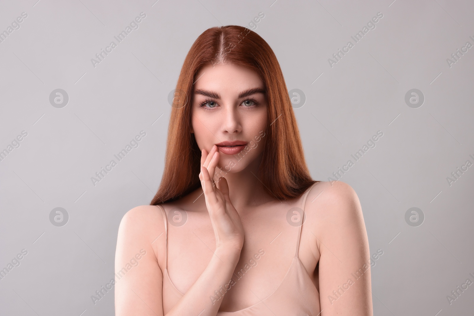 Image of Gorgeous woman with perfect skin on grey background