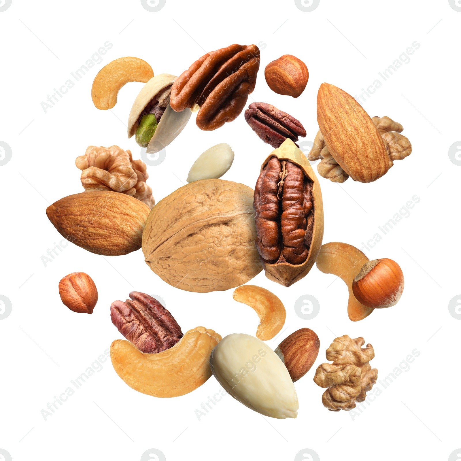 Image of Pecan and other nuts in air on white background