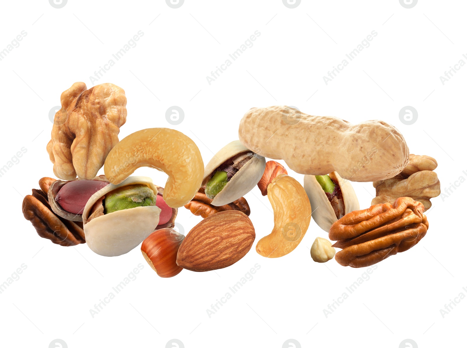 Image of Pecan and other nuts in air on white background