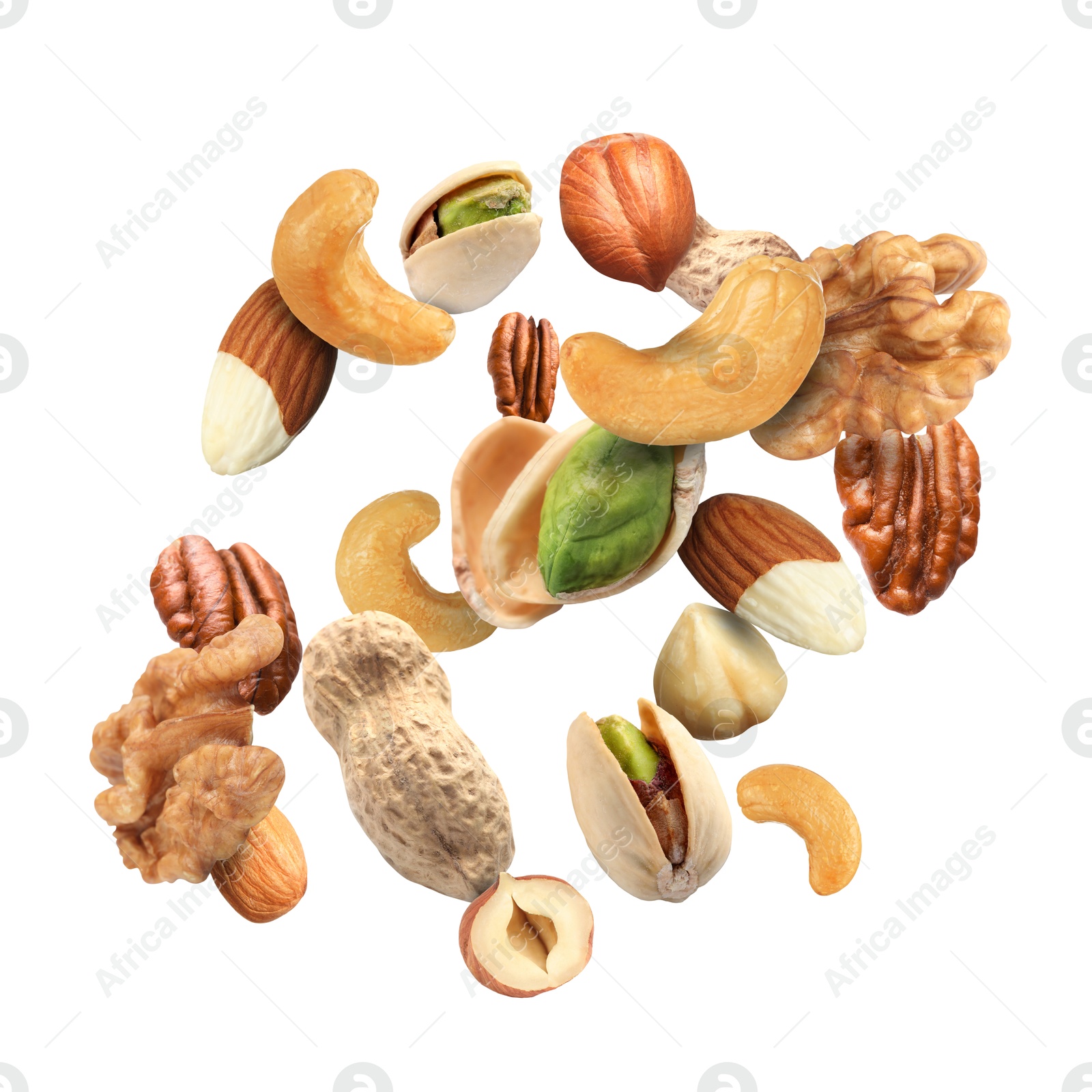 Image of Pecan and other nuts in air on white background