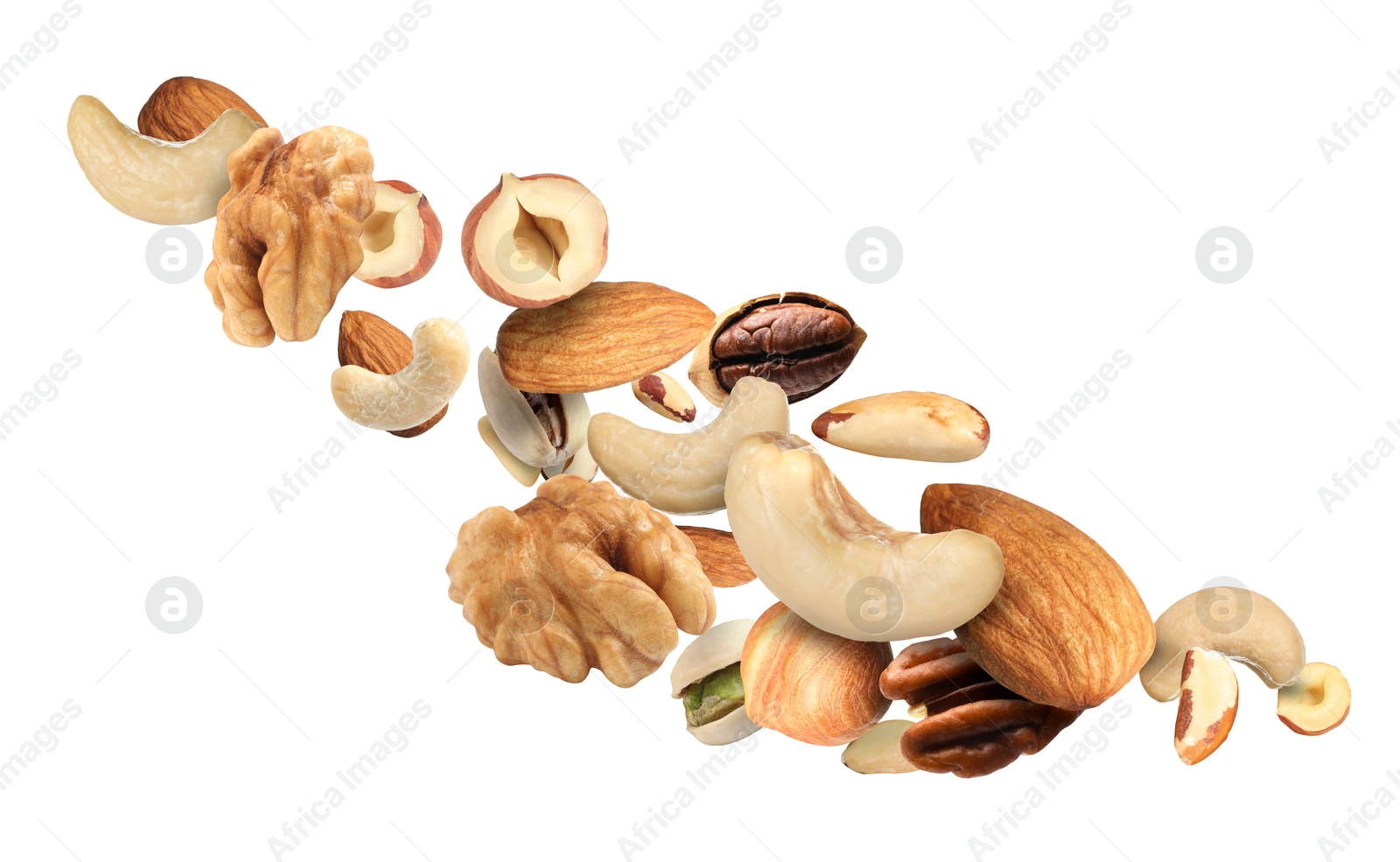 Image of Pecan and other nuts in air on white background