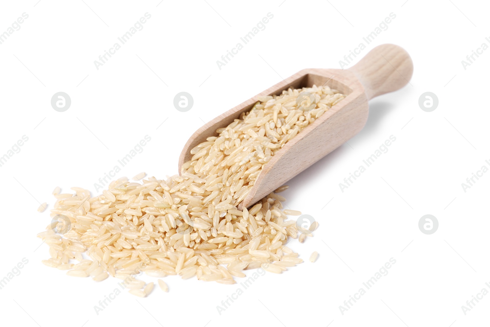 Photo of Raw rice in wooden scoop isolated on white