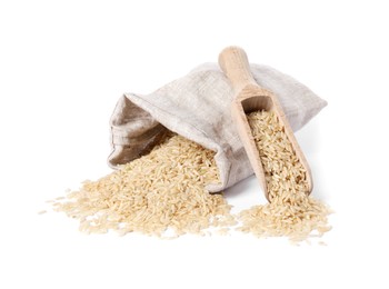 Photo of Raw rice in burlap with scoop isolated on white