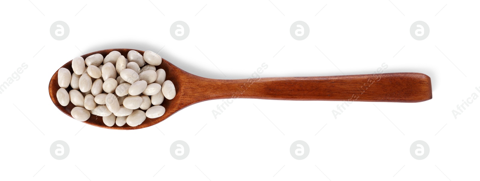 Photo of Dried beans in wooden spoon isolated on white, top view