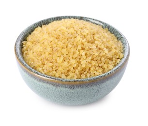 Photo of Raw bulgur in bowl isolated on white