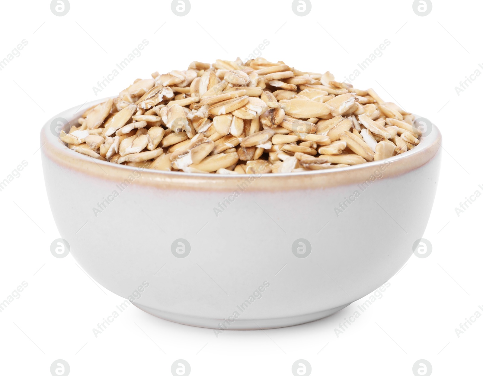 Photo of Dry oat flakes in bowl isolated on white