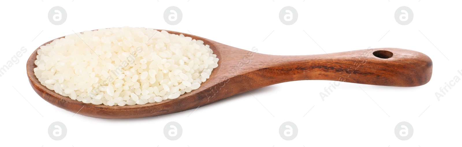 Photo of Raw rice in wooden spoon isolated on white