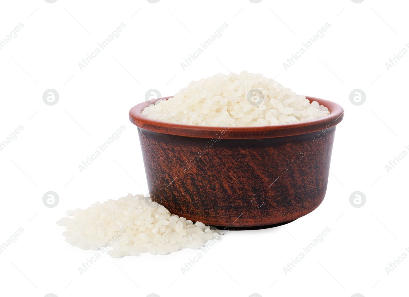 Photo of Raw rice in bowl isolated on white