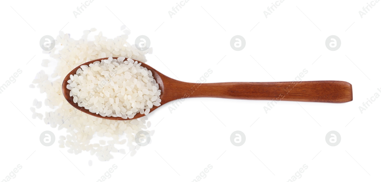 Photo of Raw rice in wooden spoon isolated on white, top view