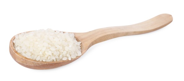 Photo of Raw rice in wooden spoon isolated on white