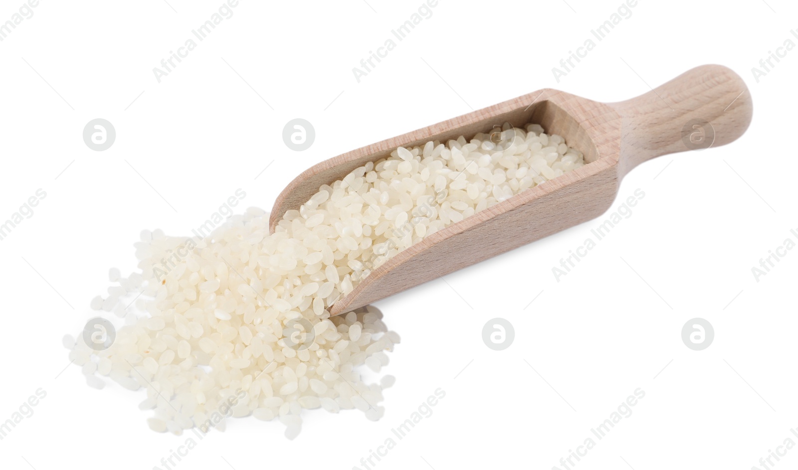 Photo of Raw rice in wooden scoop isolated on white