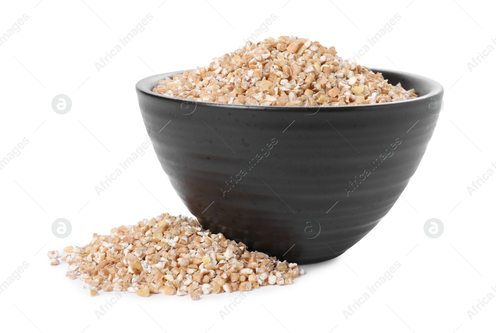 Photo of Dry wheat groats in bowl isolated on white