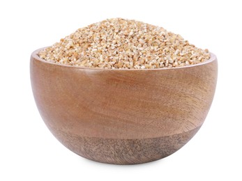 Photo of Dry wheat groats in wooden bowl isolated on white