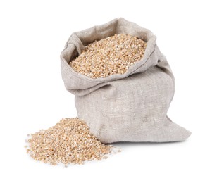 Photo of Dry wheat groats in burlap sack isolated on white