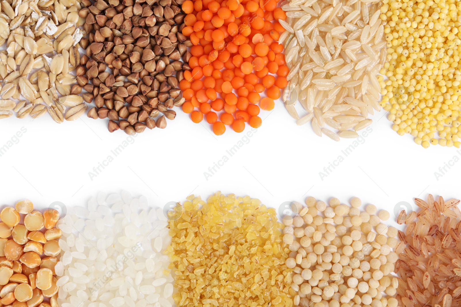 Photo of Different cereal grains isolated on white, top view