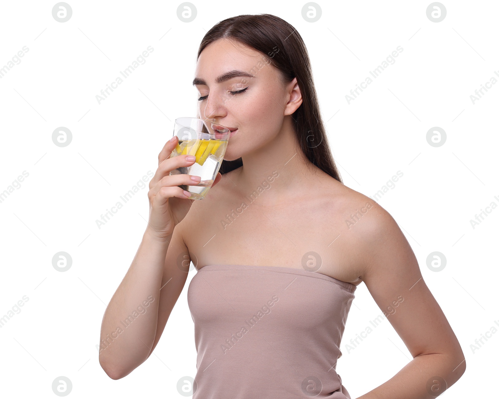 Photo of Woman drinking water with lemon on white background