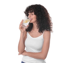 Photo of Woman drinking water with lemon on white background