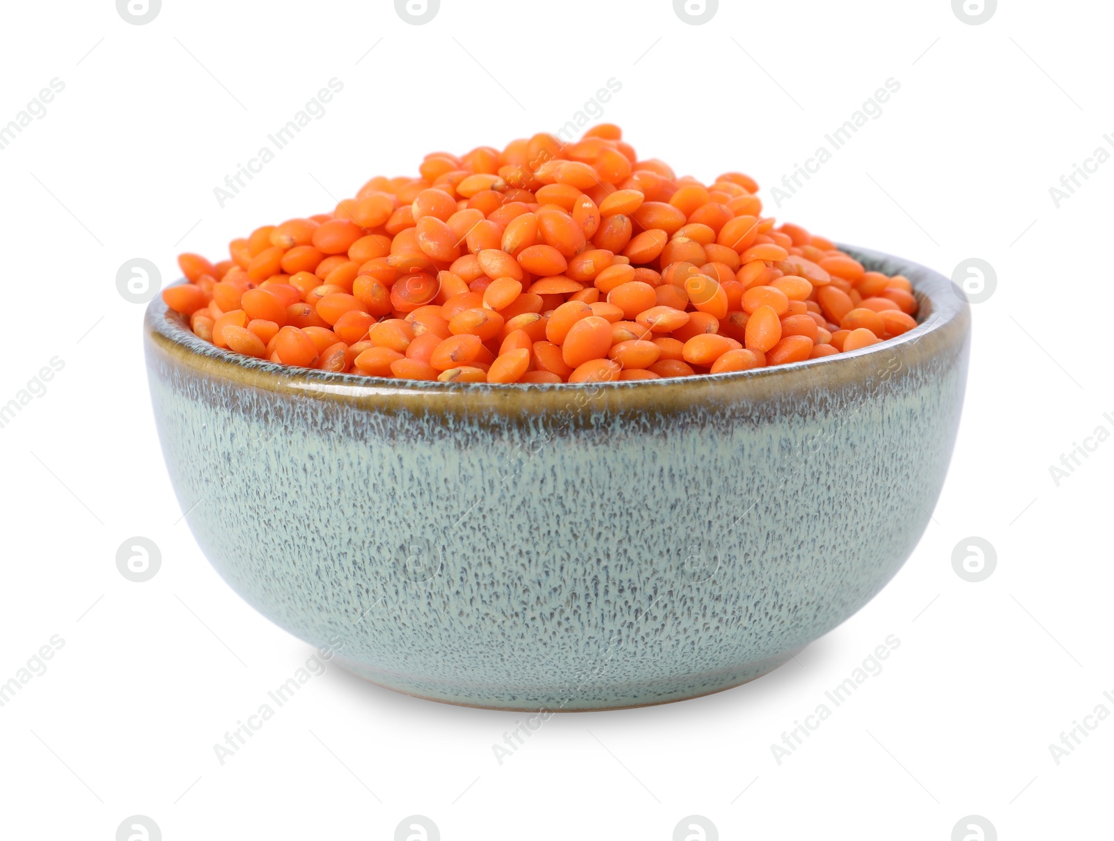 Photo of Raw lentils in bowl isolated on white