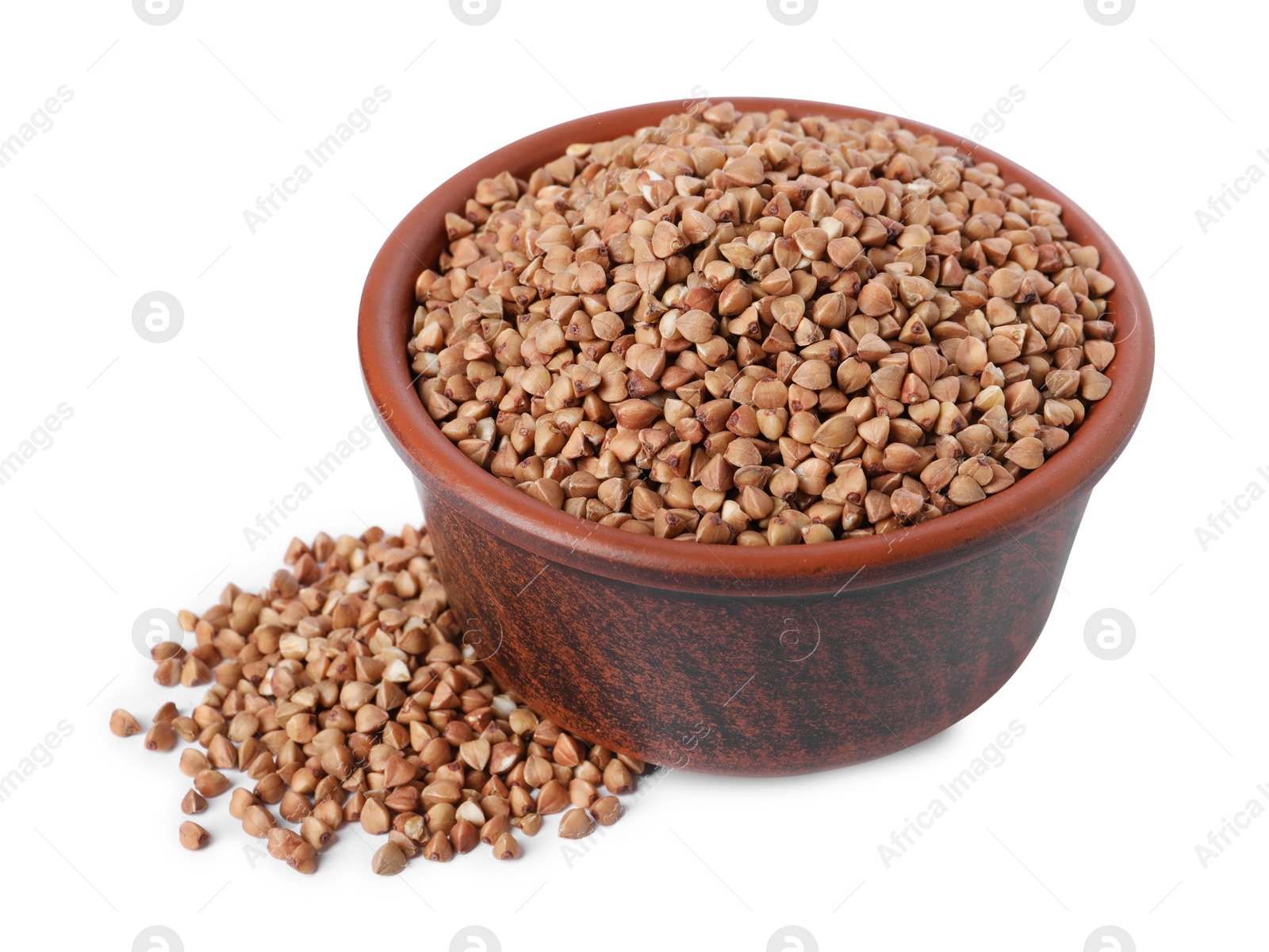 Photo of Raw buckwheat in bowl isolated on white