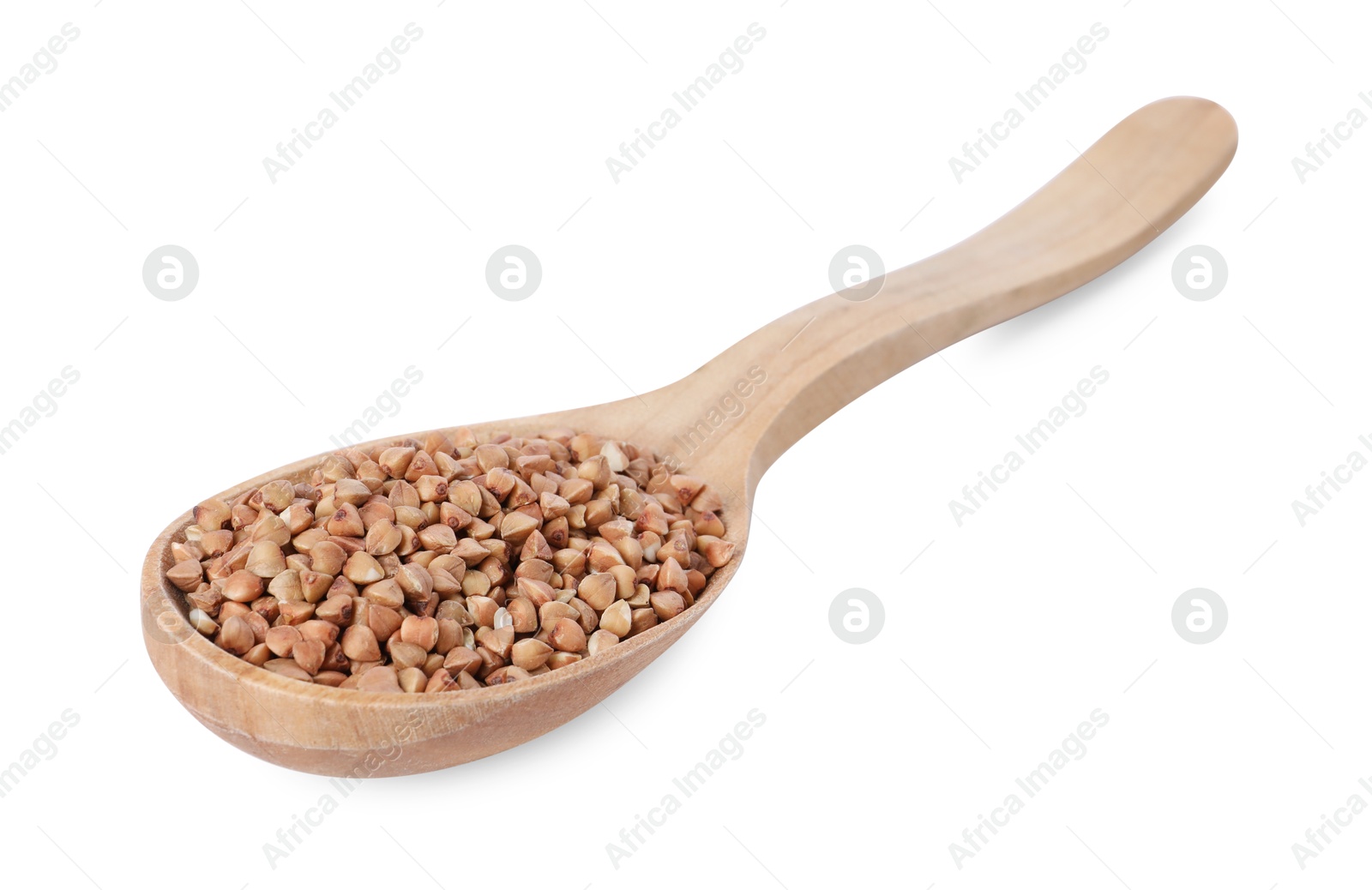 Photo of Raw buckwheat in wooden spoon isolated on white