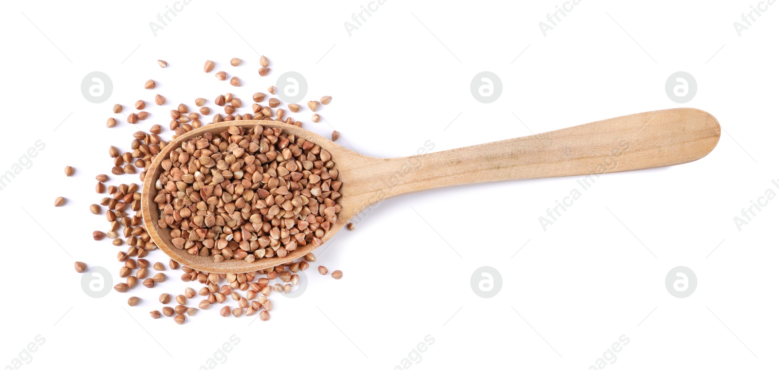 Photo of Raw buckwheat in wooden spoon isolated on white, top view