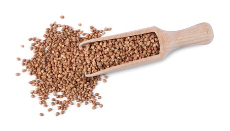 Photo of Raw buckwheat in wooden scoop isolated on white, top view