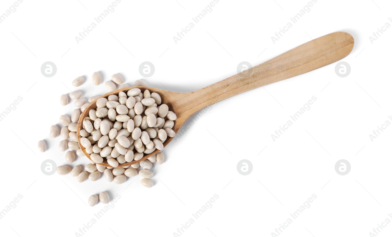 Photo of Dried beans in wooden spoon isolated on white, top view